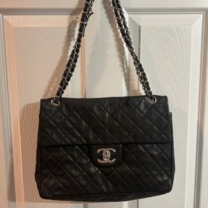 Chanel jumbo black quilted flap bag
